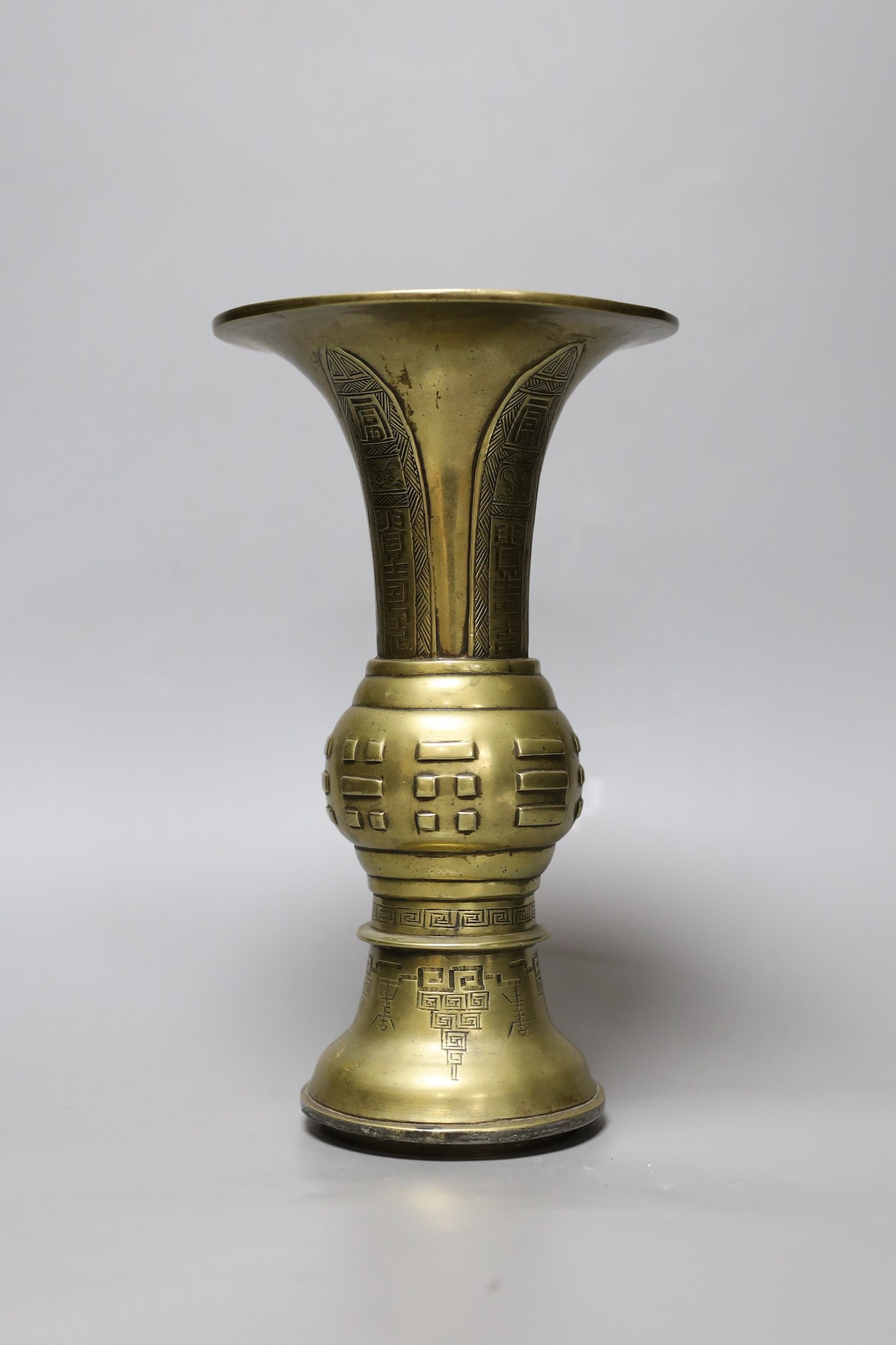 A Chinese bronze gu vase, Welsh inscription and date for 1924, 26cm high